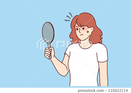 Irritated woman looks in mirror, feeling anger because skin problems spoiling appearance 110822214