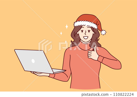 Christmas woman with laptop shows thumbs up recommending online shopping during new year holidays Christmas woman with laptop shows thumbs up recommending online shopping during new year holidays 110822224