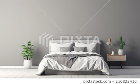 Interior of a modern spacious bedroom with gray walls, wooden floors and a comfortable double bed. 110822416