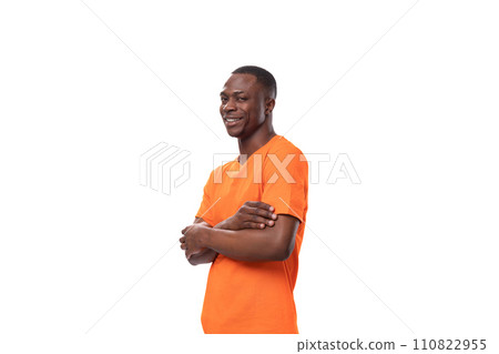 young kind american guy with short haircut dressed in orange t-shirt isolated studio white 110822955