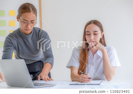 Business management group team meeting to plan strategies to increase business income in work office. Communication brainstorming graph analysis and discuss the new target success Business management group team meeting to plan strategies to increase business income in work office. Communication brainstorming graph analysis and discuss the new target success 110823491