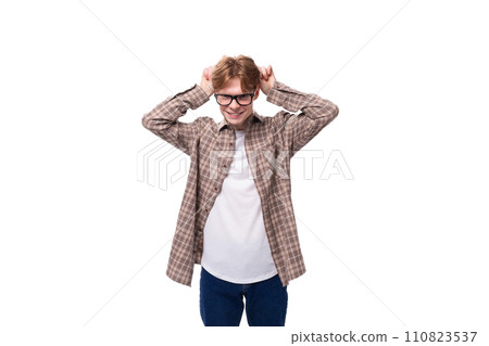 portrait of a handsome caucasian student guy with glasses on a white background portrait of a handsome caucasian student guy with glasses on a white background 110823537