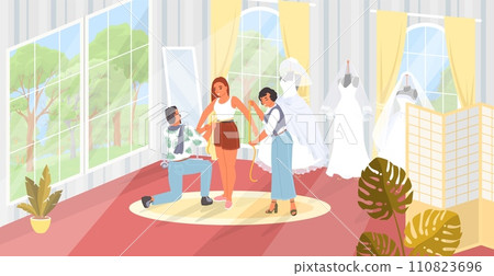 Team of tailor master taking measure of pretty bride for wedding dress 110823696