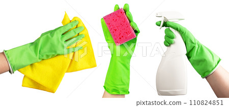 Hand in green glove holding washing sponge, cloth wiper for dust and spray bottle isolated on white Hand in green glove holding washing sponge, cloth wiper for dust and spray bottle isolated on white 110824851