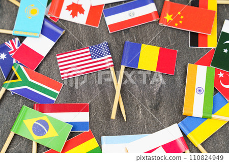 The concept is diplomacy. In the middle among the various flags are two flags - USA, Romania 110824949