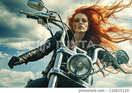 Portrait of a red-haired biker on a motorcycle from the bottom angle, portrait of a serious young woman, idea of wanderlust, active lifestyle Portrait of a red-haired biker on a motorcycle from the bottom angle, portrait of a serious young woman, idea of wanderlust, active lifestyle 110825110