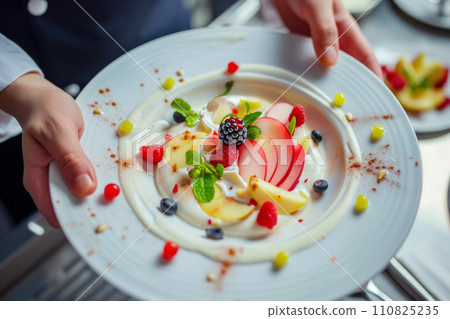top view, chef holding plate with dessert of Greek yogurt and fruits, vegetarian menu with cafe 110825235