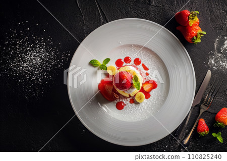 Minimalist serving of strawberry-banana sorbet in a cafe with molecular vegetarian cuisine, new weight loss trends, unexpected food combinations 110825240