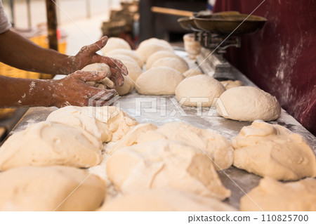Process of making bread. dough kneading 110825700