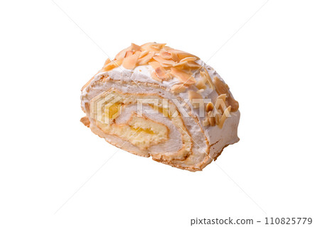 A piece of delicious sweet meringue roll with mascarpone cheese, berries and almonds A piece of delicious sweet meringue roll with mascarpone cheese, berries and almonds 110825779