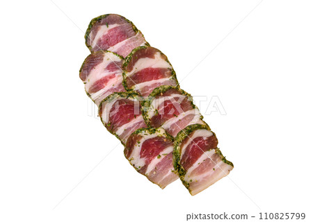 Delicious meatloaf with lard, salt, spices and herbs cut into slices 110825799