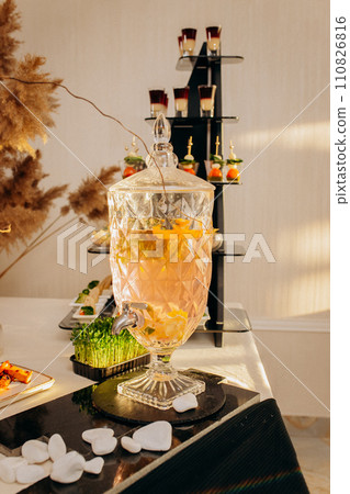 Assortment of delicious snacks on the open buffet festive table in restaurant. Catering plate Assortment of delicious snacks on the open buffet festive table in restaurant. Catering plate 110826816