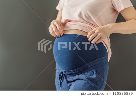 Chic maternity pants, comfy belly insert for expecting moms - stylish, practical, and perfect for the journey into motherhood 110826889