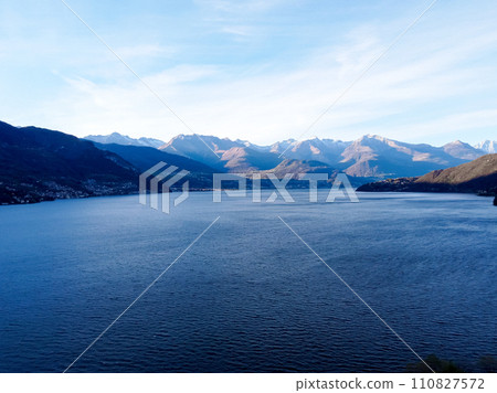 A beautiful view across the water with coastal landscape scenery changing along  110827572