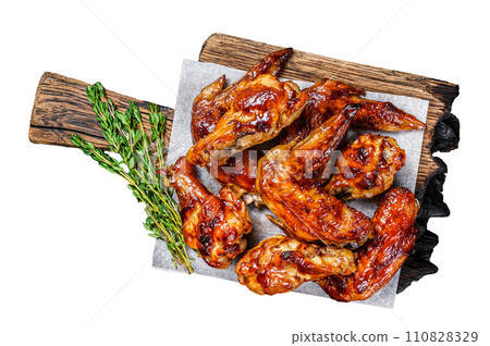 Baked Bbq chicken wings with dip sauce. Isolated on white background, Top view. 110828329