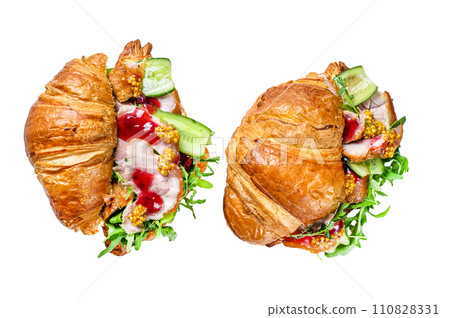 Croissant sandwich with cheese, arugula and ham. Isolated on white background, Top view. 110828331
