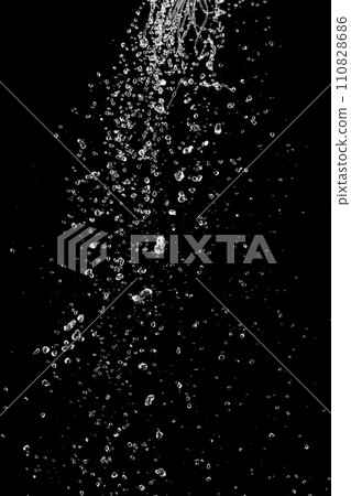Shape form throw of Water splashes into drop water attack fluttering in air and stop motion freeze shot. Splash Water for explosion texture graphic resource elements, black background isolated Shape form throw of Water splashes into drop water attack fluttering in air and stop motion freeze shot. Splash Water for explosion texture graphic resource elements, black background isolated 110828686