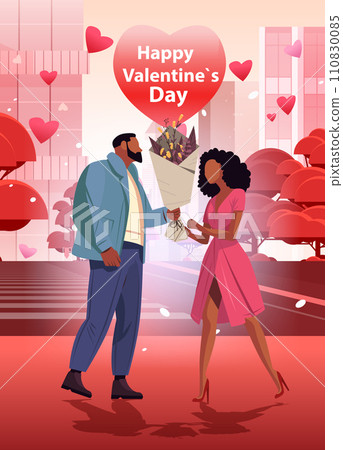 man giving bouquet of flowers to beautiful woman happy valentines day celebration concept air balloons in heart shape man giving bouquet of flowers to beautiful woman happy valentines day celebration concept air balloons in heart shape 110830085