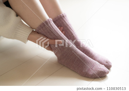 A woman wearing socks 110830513