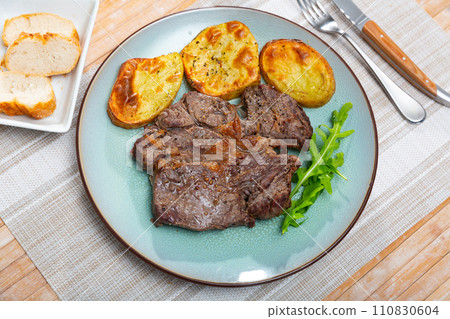Appetizing beef with potatoes 110830604