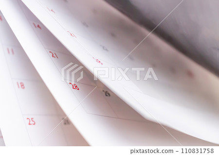 Calendar page flipping sheet close up blur background business schedule planning appointment meeting concept 110831758