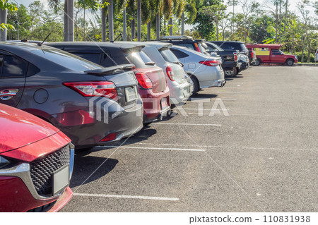 Cars parked in the outdoor parking lot 110831938