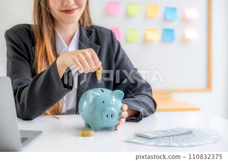 Business caucasian woman putting coin into piggy bank, step up start up business to success, Saving money for future plan and retirement fund concept Business caucasian woman putting coin into piggy bank, step up start up business to success, Saving money for future plan and retirement fund concept 110832375