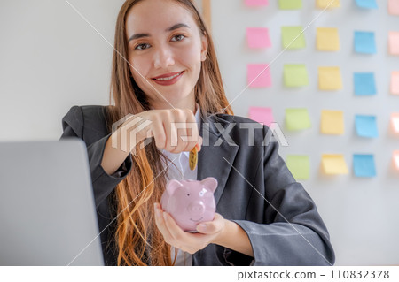 Business caucasian woman putting coin into piggy bank, step up start up business to success, Saving money for future plan and retirement fund concept Business caucasian woman putting coin into piggy bank, step up start up business to success, Saving money for future plan and retirement fund concept 110832378