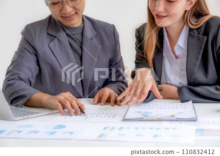 Business management group team meeting to plan strategies to increase business income in work office. Communication brainstorming graph analysis and discuss the new target success Business management group team meeting to plan strategies to increase business income in work office. Communication brainstorming graph analysis and discuss the new target success 110832412