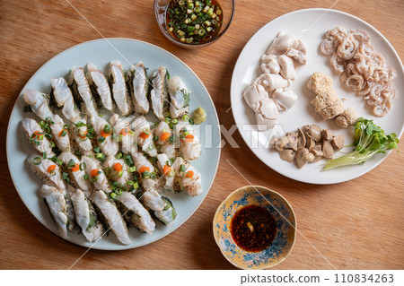 A table full of sea bass 110834263