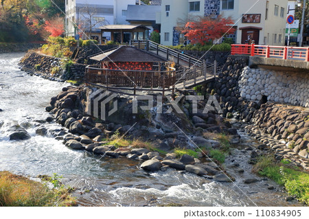 Tokko no Yu, an open air foot bath located on the Katsura river at Shuzenji onsen in the Izu peninsula of Shizuoka prefecture in Japan Tokko no Yu, an open air foot bath located on the Katsura river at Shuzenji onsen in the Izu peninsula of Shizuoka prefecture in Japan 110834905