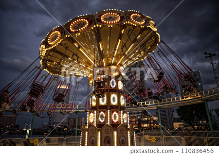 Illuminated night amusement park Illuminated night amusement park 110836456
