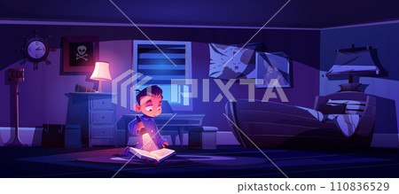 Little boy in bedroom at night reading book 110836529