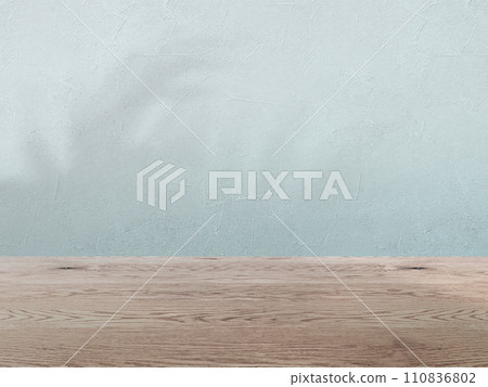 Green wall and natural brown wood floor background image material, wall and flooring background with light shadows 110836802