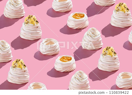 Pattern, Pavlova cakes 4 stages of preparation. on a pink background with hard shadows Pattern, Pavlova cakes 4 stages of preparation. on a pink background with hard shadows 110839422