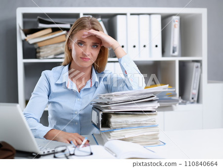 Lot of work wait for tired and exhausted woman 110840664