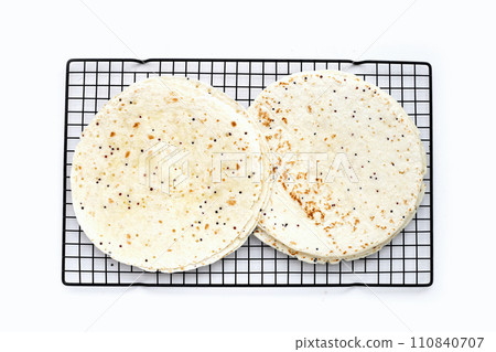 Quinoa tortilla wraps on white background Quinoa tortilla wraps on white background 110840707
