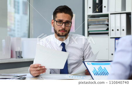 Group of people hold in arms financial papers solve and discuss problem 110840740