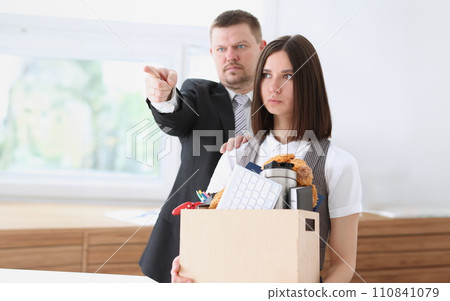 Angry yelling boss point arm to exit 110841079