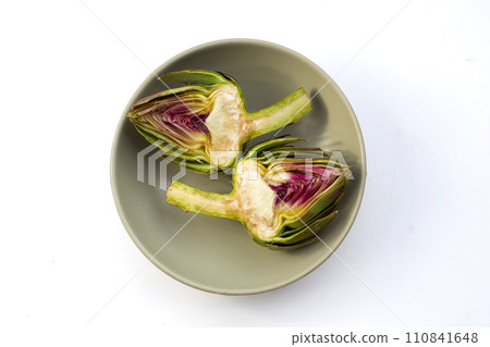 Fresh artichoke on white background. Fresh artichoke on white background. 110841648