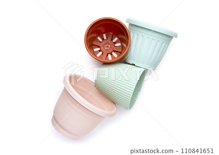 Plastic plant pots, containers on white background. Plastic plant pots, containers on white background. 110841651