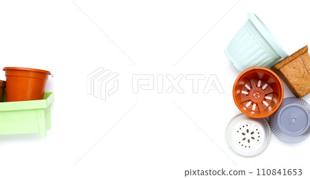 Plastic plant pots, containers on white background. Plastic plant pots, containers on white background. 110841653