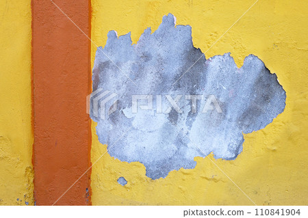 Cracked yellow paint on cement wall Cracked yellow paint on cement wall 110841904