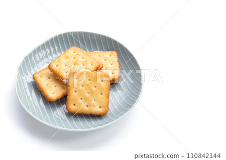 Biscuits in plate on white background. Biscuits in plate on white background. 110842144