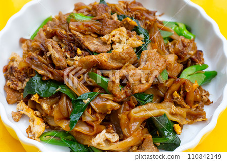 Stir-fried rice noodles with soy sauce and pork Stir-fried rice noodles with soy sauce and pork 110842149