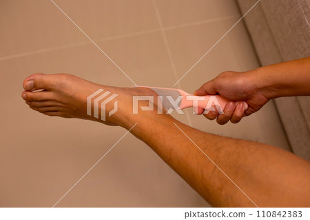 Foot with foot file, Cleansing the heel 110842383