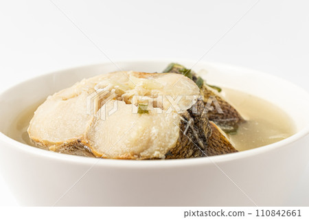 Cod soup on a white background Cod soup on a white background 110842661