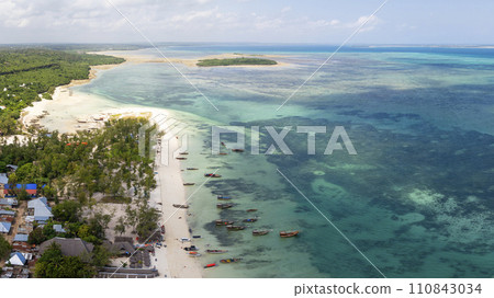 Zanzibar panorama of the fishing boats on tropical sea coast at sunny day 110843034