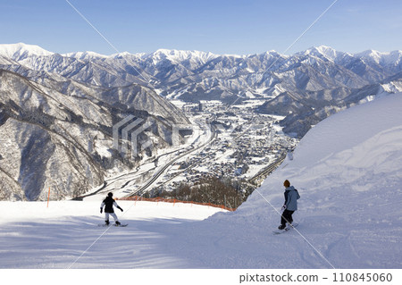 children enjoying snowboarding children enjoying snowboarding 110845060
