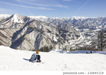 children enjoying snowboarding children enjoying snowboarding 110845119